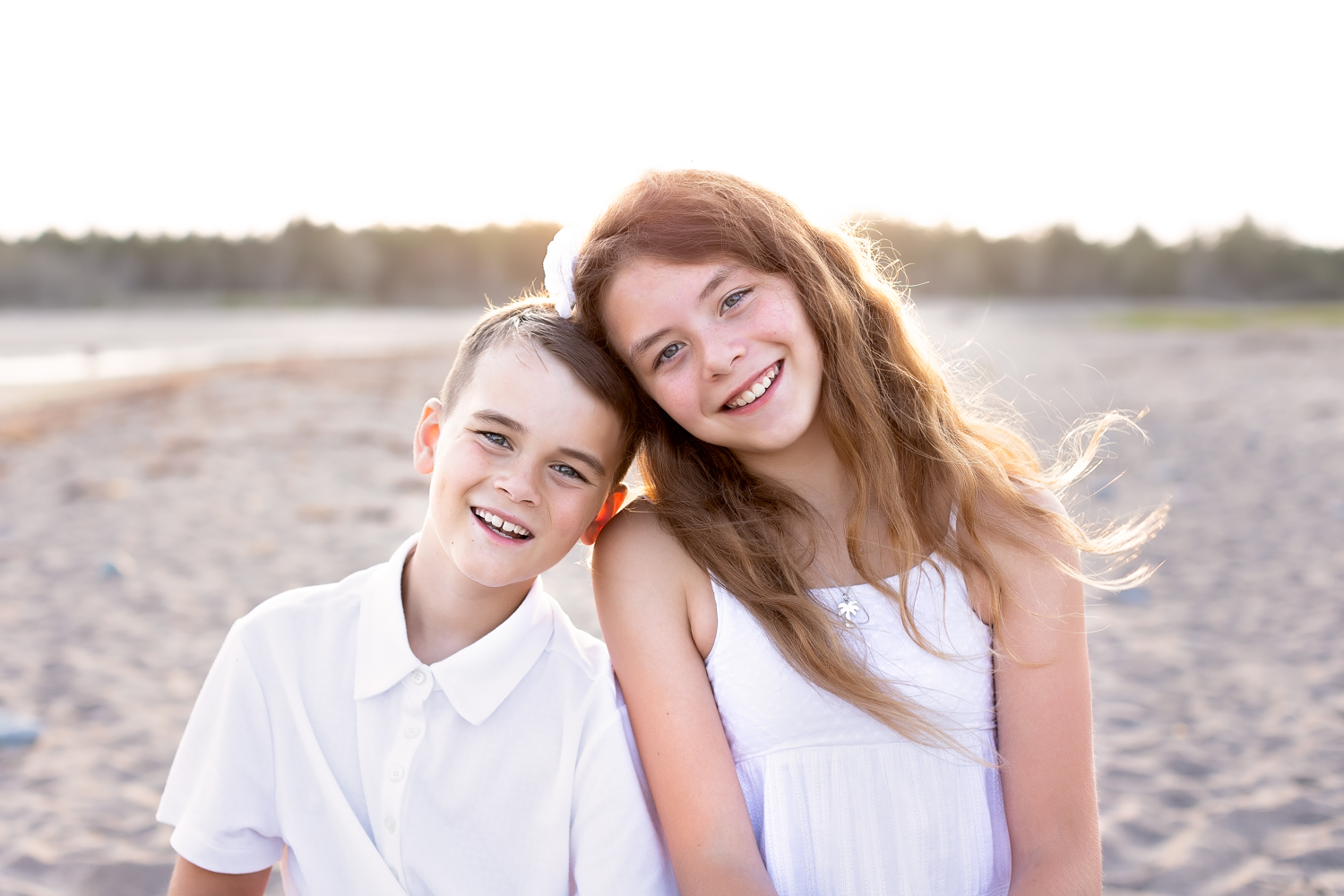 Two children smiling during photo session